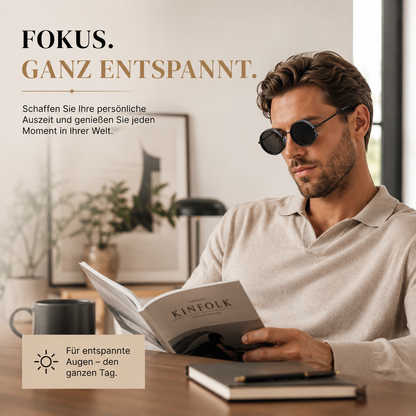 Person trägt eine runde Retro-Sonnenbrille beim Entspannen im Freien