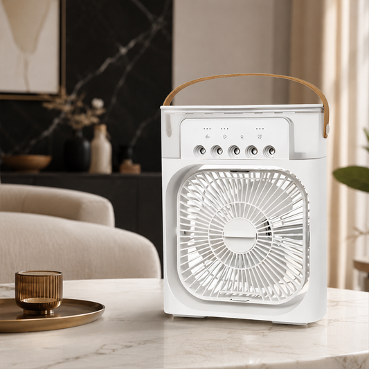 Genießen Sie jederzeit eine angenehme Abkühlung mit diesem tragbaren, wiederaufladbaren Luftkühler. Das moderne, minimalistische Design kombiniert leistungsstarke Luftzirkulation mit einer eleganten Optik. Ausgestattet mit einem integrierten Ventilator, benutzerfreundlichen Bedienelementen und einem hochwertigen Tragegriff in Lederoptik lässt sich das Gerät bequem überallhin mitnehmen.